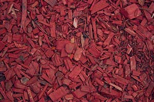 Red wood chips texture, wooden decorative background red wood chips